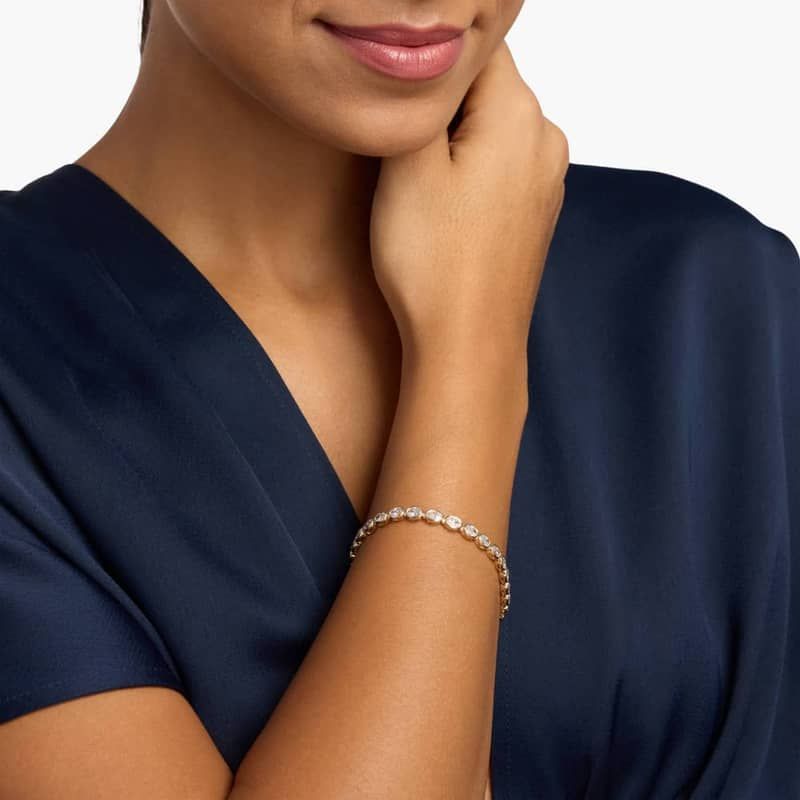 7 " Oval Cut Diamond E/W Bezel Set Tennis Bracelet In 14K Yellow Gold (8 Ct. tw. - H-I / SI1-SI2)