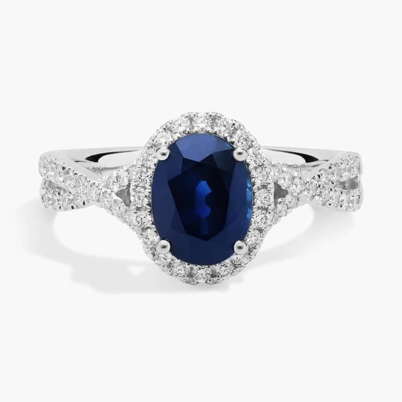 Oval Sapphire and Diamond Halo Twist Ring in 14k White Gold (8x6mm)