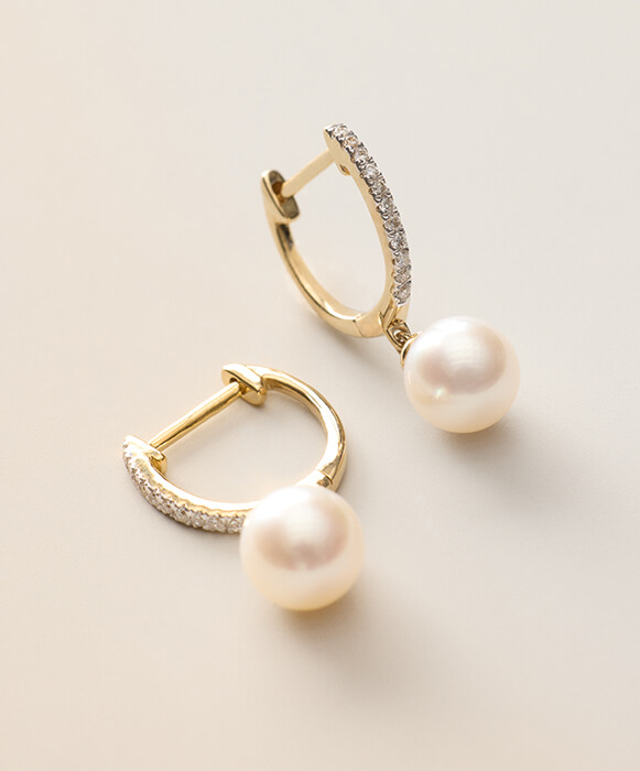 akoya pearl and diamond drop hoop earrings in yellow gold